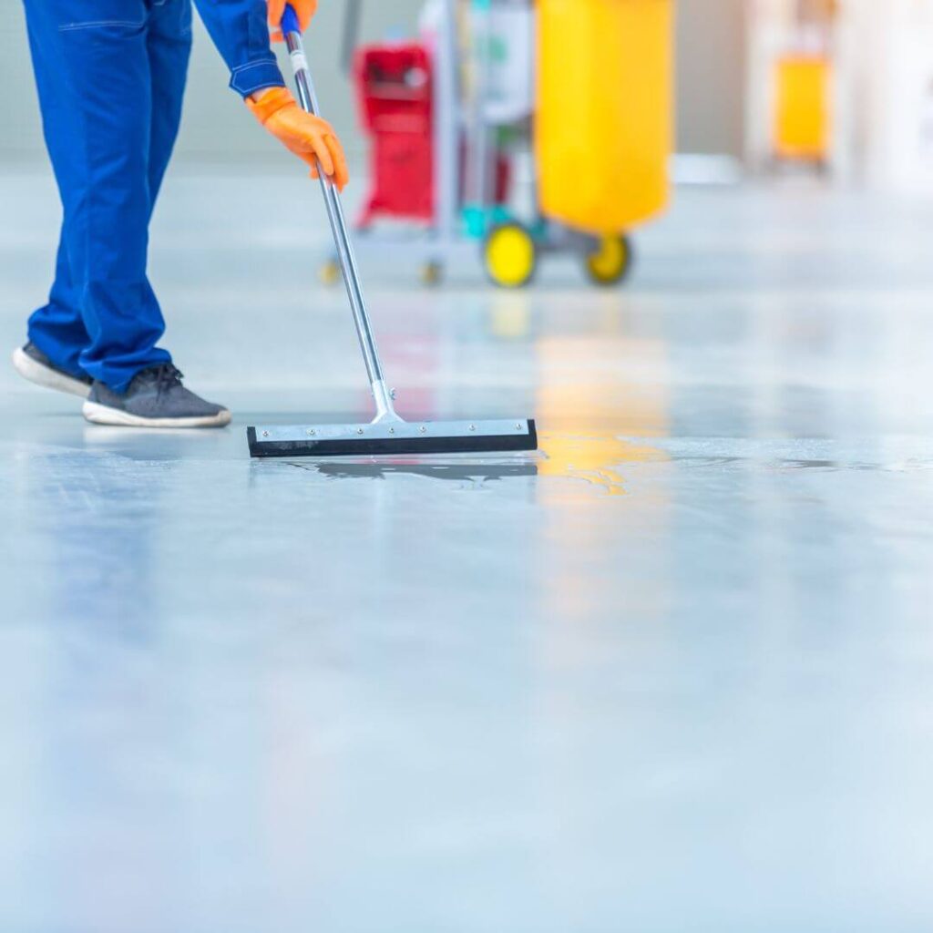 A person mopping the floor